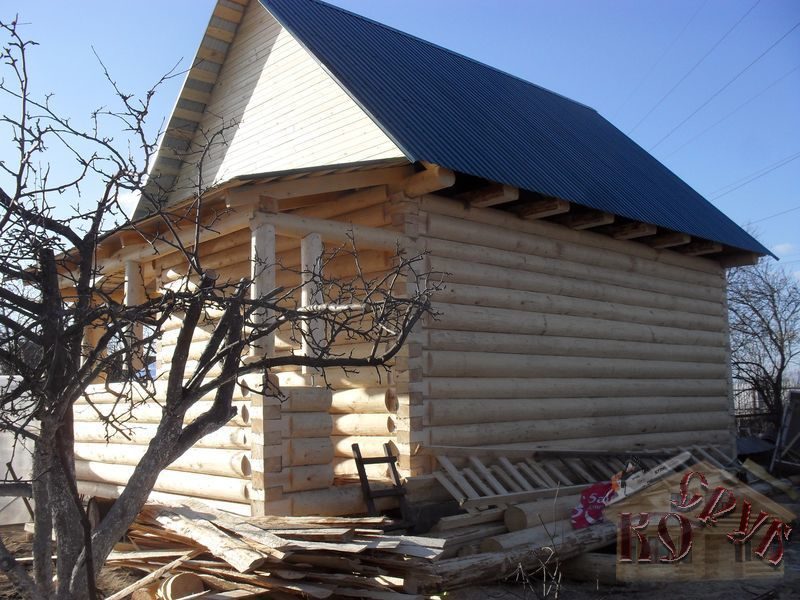 Дом из бревна в лапу
