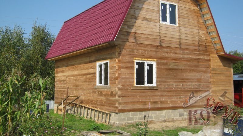 Обшивка брусового дачного дома сайдингом