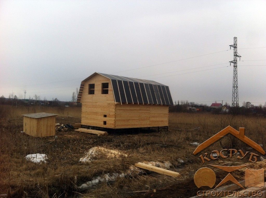 Одноэтажный дом из бруса с ломаной крышей